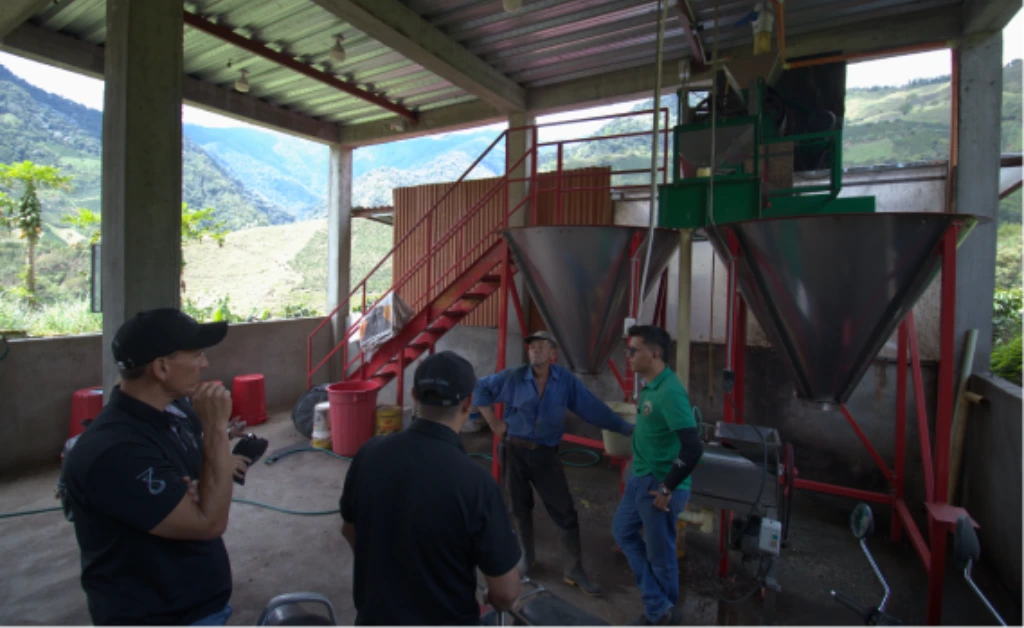 La Reserva 22 founders meeting with Colombian coffee producers at their farms to discuss direct trade relationships